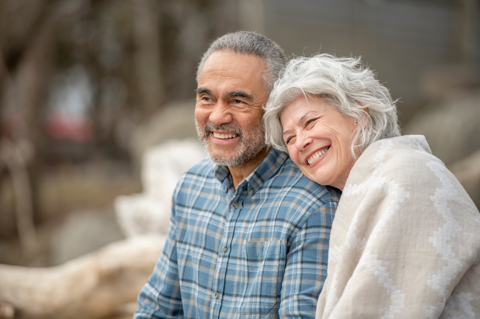 Senior couple outside together at retirement community